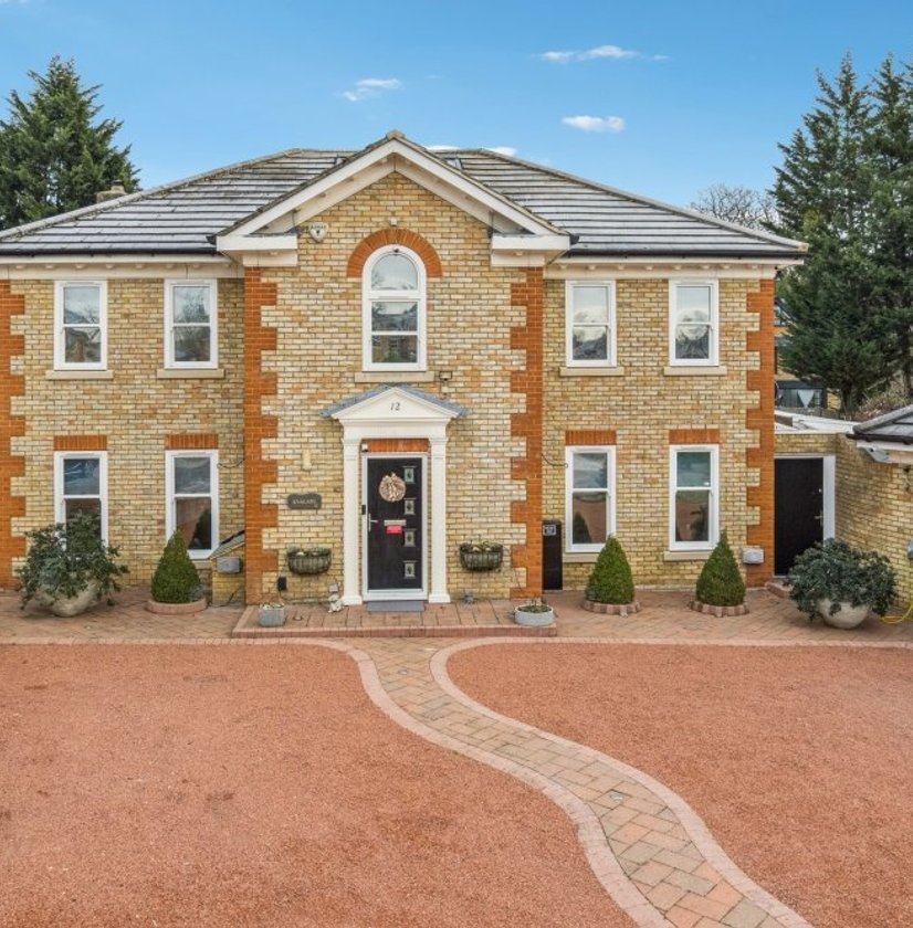 Front elevation of the completed Elmwood Park house, finished in gault brick with red brick quoins